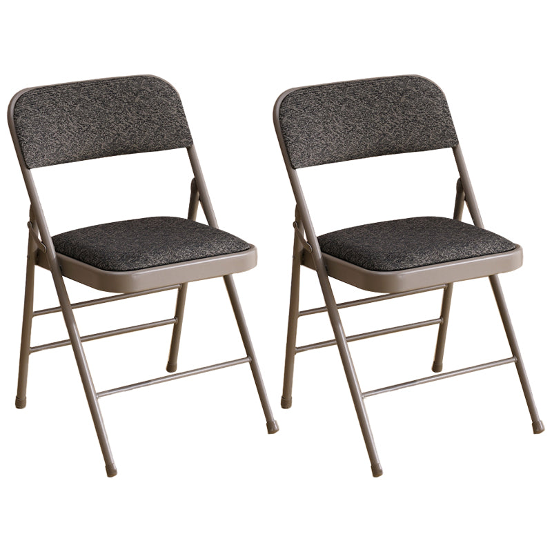 Les chaises latérales tapissées se pliantes de style industriel ouvrent les chaises latérales de salle à manger arrière