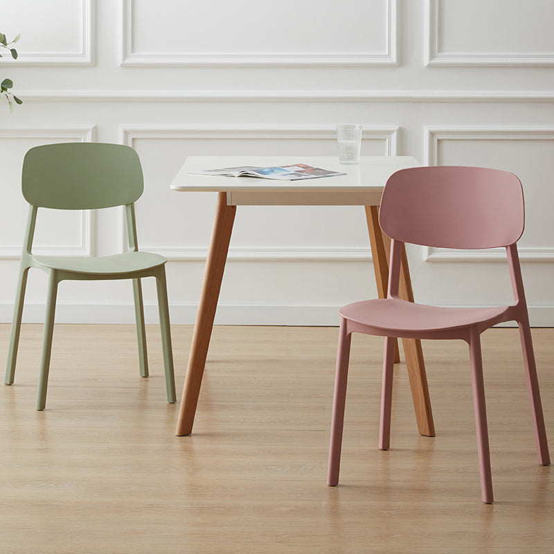 Sillas de comedor escandinavas sin brazos Silla auxiliar de comedor de plástico con respaldo abierto (juego de 4)