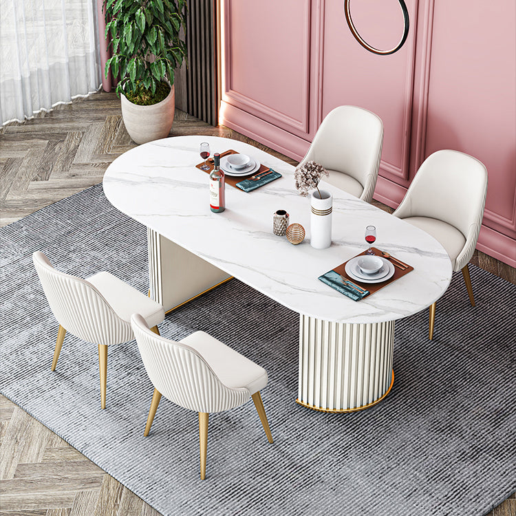 Ovaal gesinterde stenen eettafel moderne tafel in wit met metalen dubbele voetstukbasis