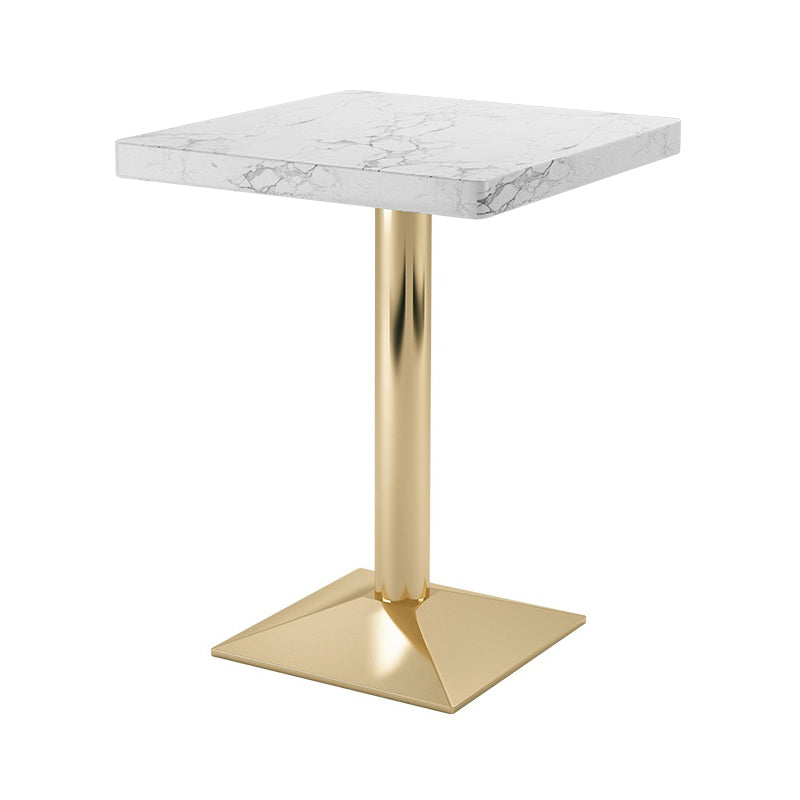 Mesa de comedor industrial de madera maciza con base de pedestal de metal