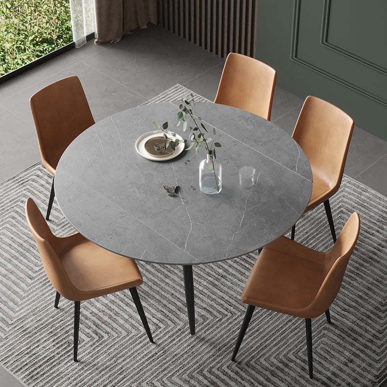 Mesa de comedor redonda Simplicity de piedra sinterizada con 4 patas negras para comedor