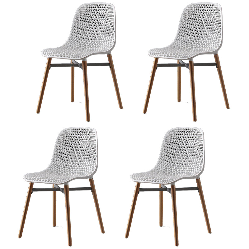 Chaise de salle à manger en plastique de style scandinave, sans accoudoirs, à dossier solide, avec pieds en bois