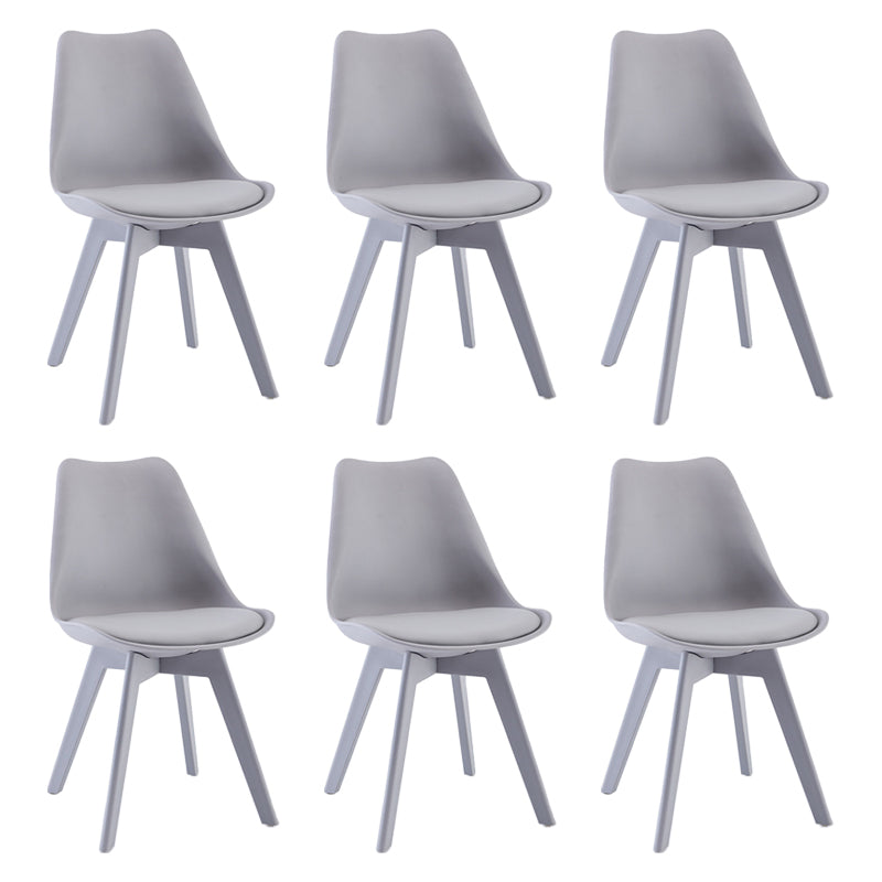 Minimalistischer Stil Plastik Ess -Armless Stuhl Polsterte feste Rückenstühle für Zuhause gepolstert