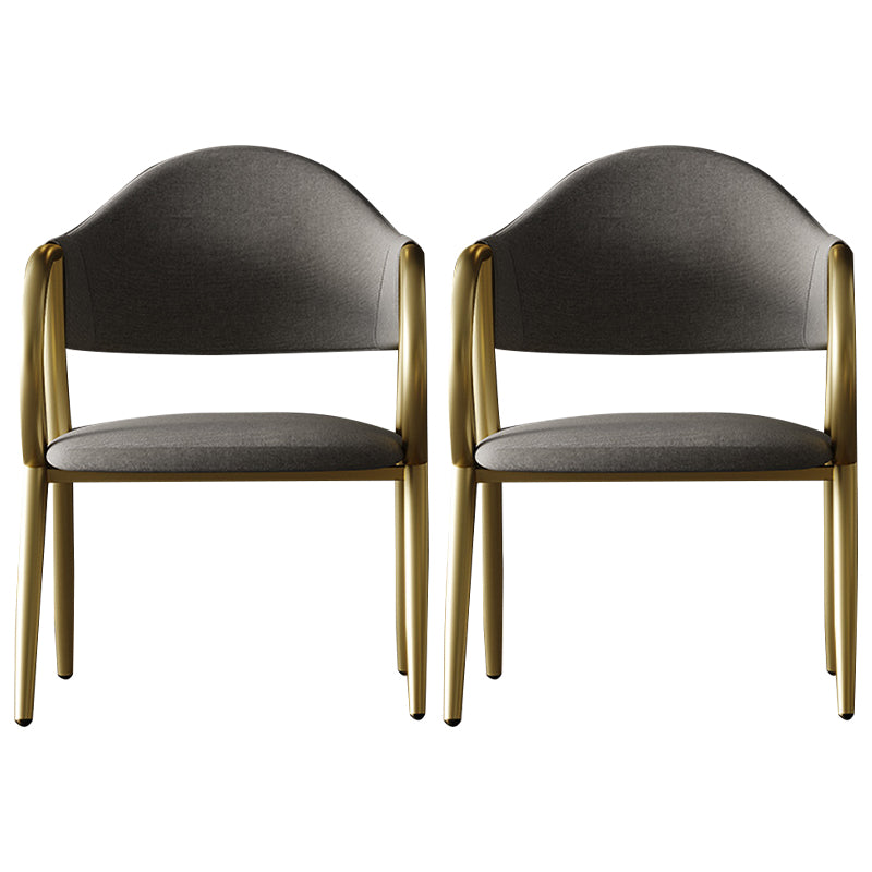 Silla de comedor de cuero industrial con respaldo abierto y patas de metal