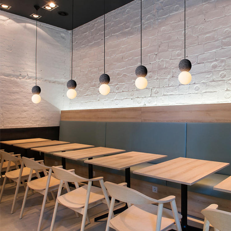 Moderne artistieke indoor hanger lichte cementbolhangenlamp met witte glazen schaduw