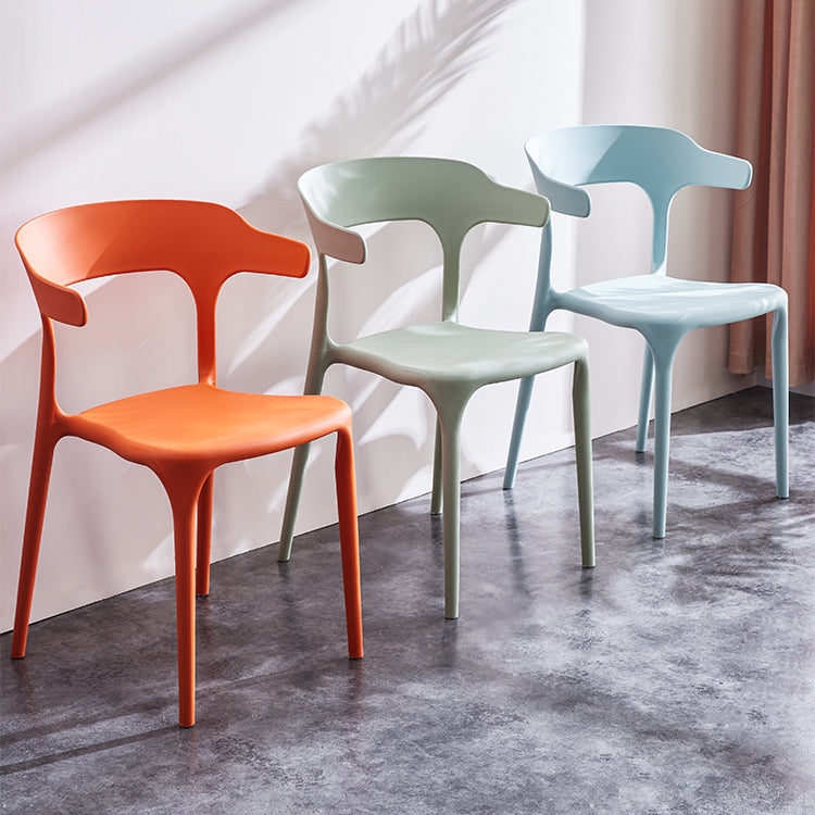 Sillas de comedor plásticas escandinavas sin brazos apilables que cenan la silla lateral