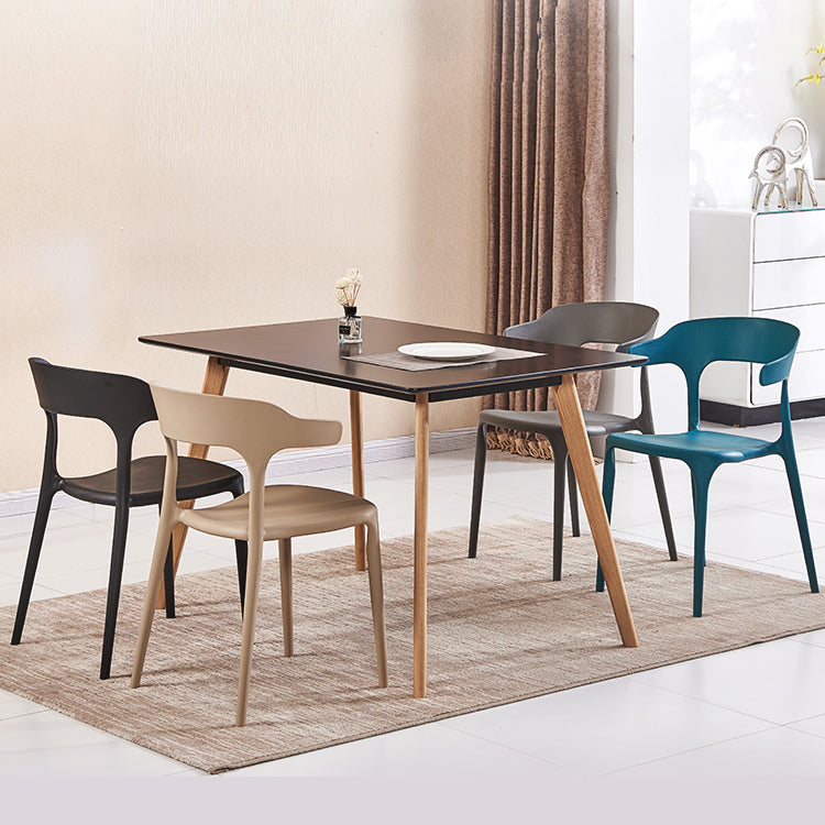 Sillas de comedor plásticas escandinavas sin brazos apilables que cenan la silla lateral