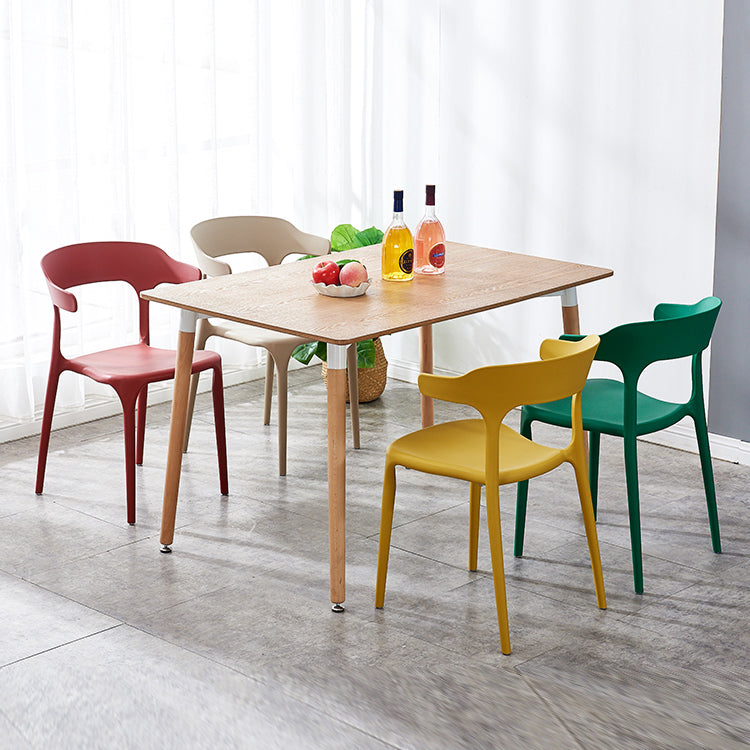 Sillas de comedor plásticas escandinavas sin brazos apilables que cenan la silla lateral