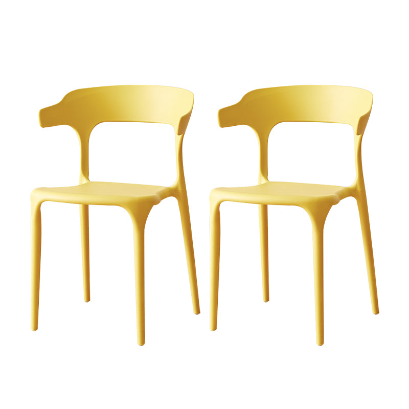 Sillas de comedor plásticas escandinavas sin brazos apilables que cenan la silla lateral