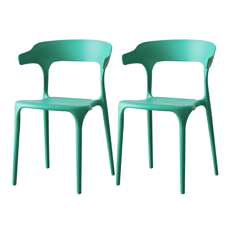 Sillas de comedor plásticas escandinavas sin brazos apilables que cenan la silla lateral