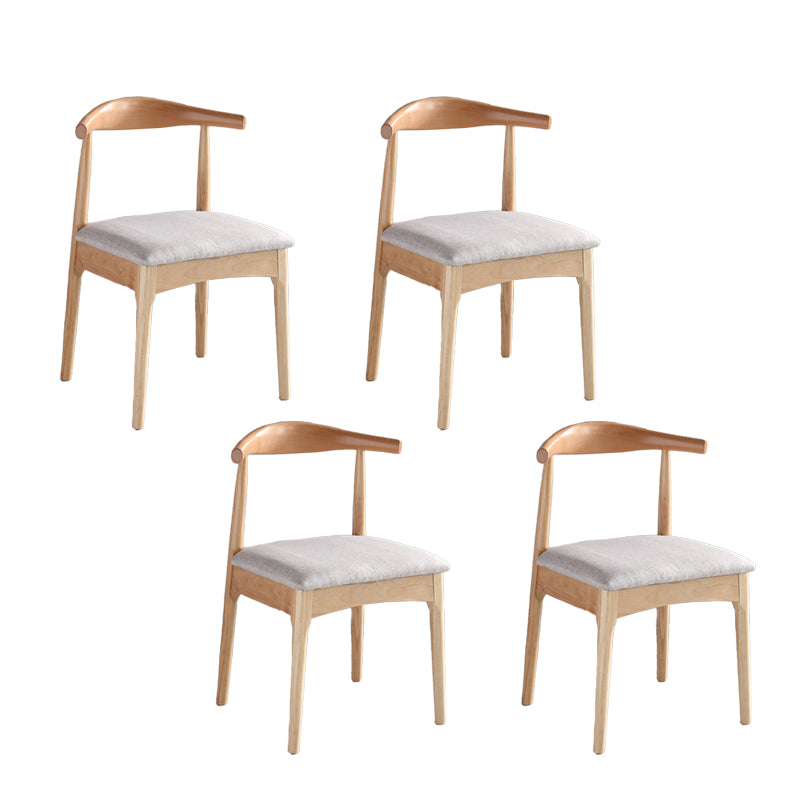 Silla lateral escandinava interior tapizada Silla de comedor de madera con respaldo abierto