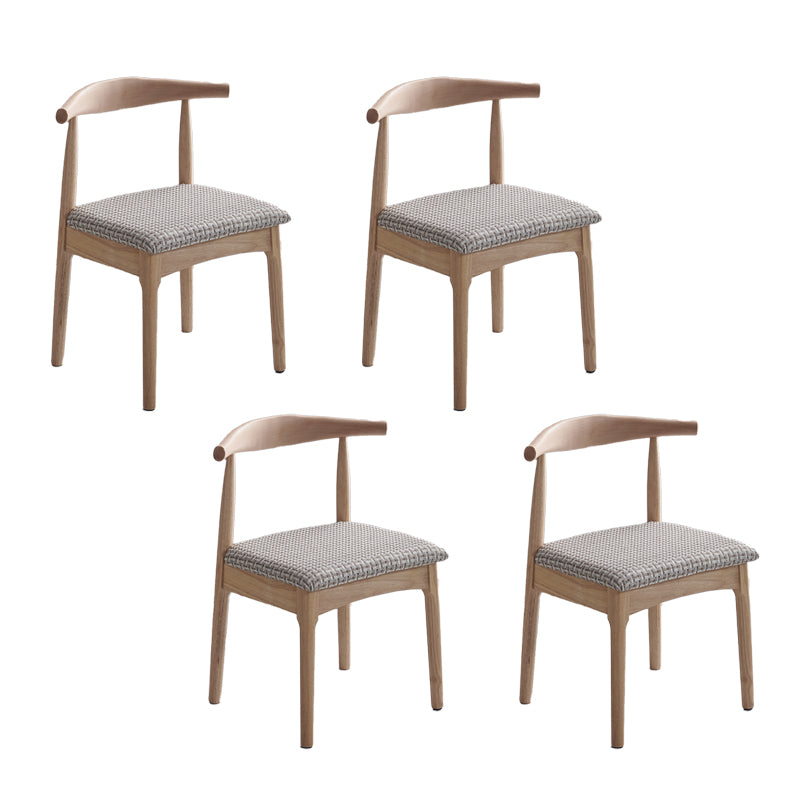 Silla lateral escandinava interior tapizada Silla de comedor de madera con respaldo abierto