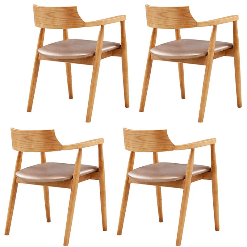 Silla de comedor de cuero contemporánea con respaldo abierto de madera