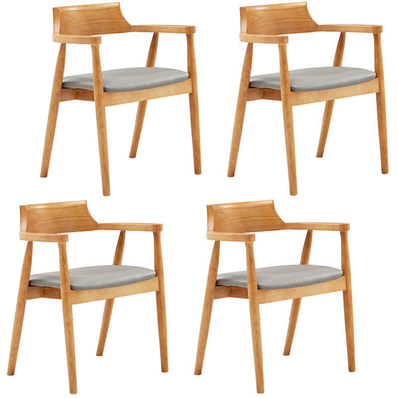 Silla de comedor de cuero contemporánea con respaldo abierto de madera