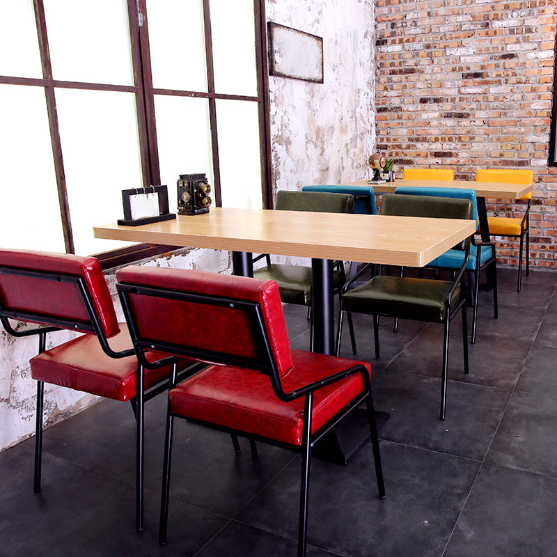 Silla de comedor industrial de cuero con respaldo abierto y acabado mate (juego de 4)
