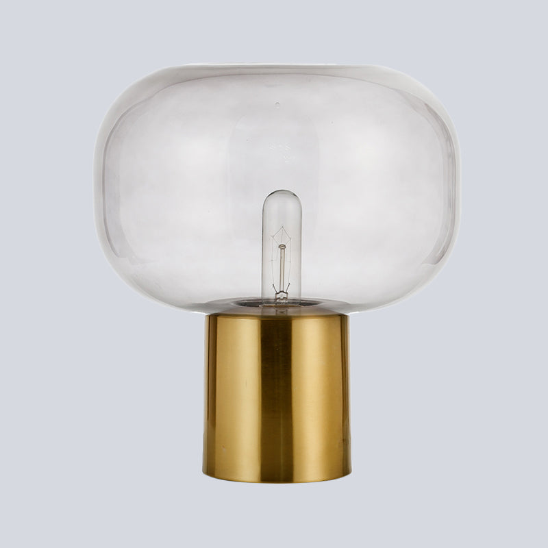 Lampada da comodino minimalista a 1 lampadina Illuminazione da tavolo ovale in metallo dorato con paralume in vetro grigio fumo
