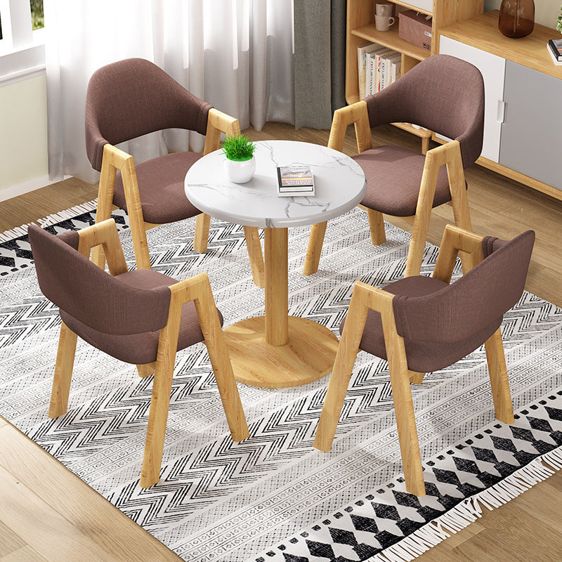Silla de comedor tapizada escandinava con respaldo abierto y acabado mate (juego de 4)