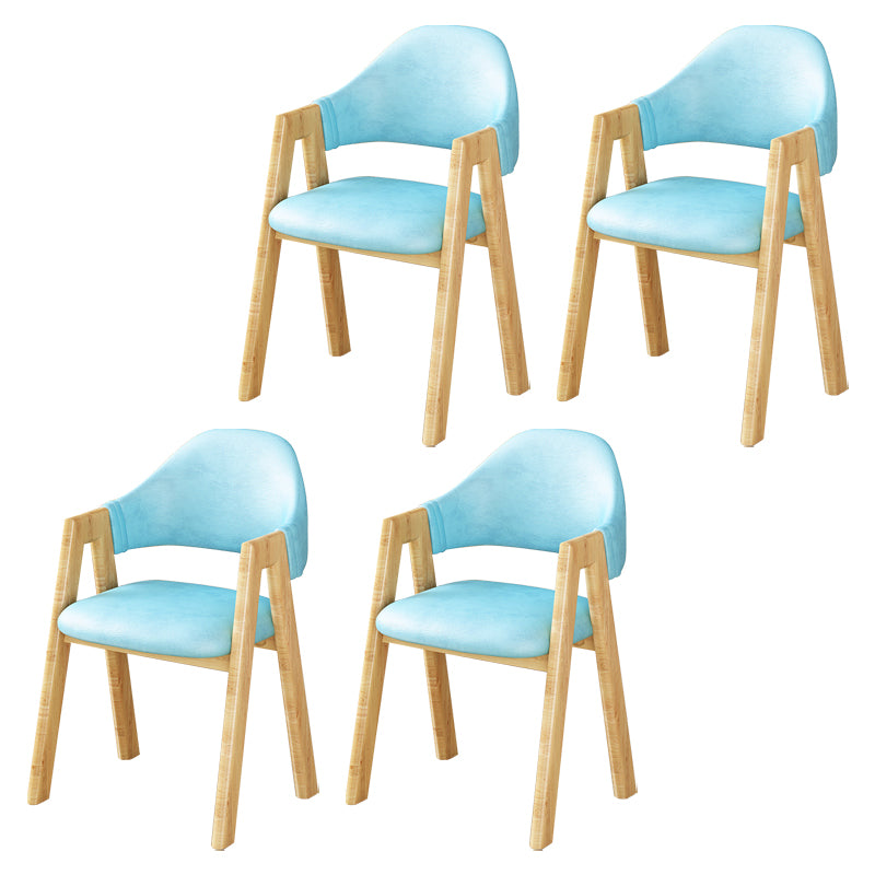 Silla de comedor tapizada escandinava con respaldo abierto y acabado mate (juego de 4)