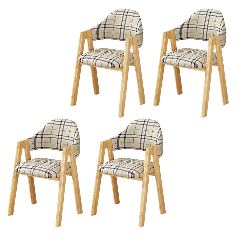 Silla de comedor tapizada escandinava con respaldo abierto y acabado mate (juego de 4)