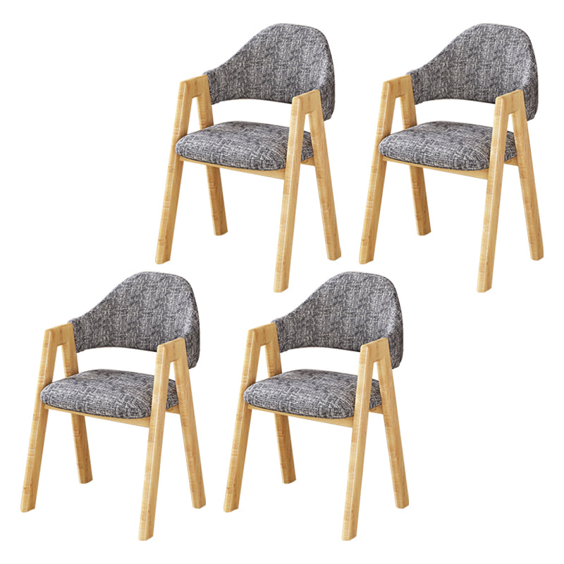 Silla de comedor tapizada escandinava con respaldo abierto y acabado mate (juego de 4)