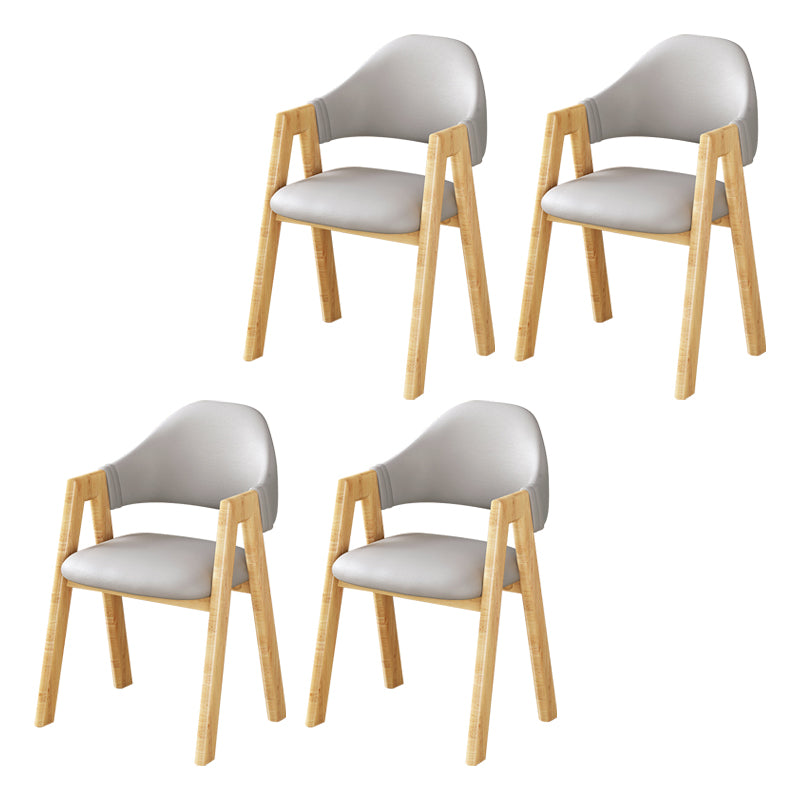Silla de comedor tapizada escandinava con respaldo abierto y acabado mate (juego de 4)
