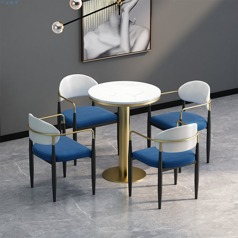 Silla de comedor tapizada estilo diseñador con respaldo abierto y acabado mate