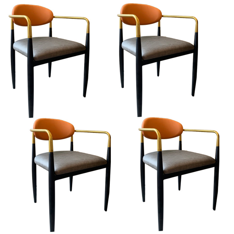 Silla de comedor tapizada estilo diseñador con respaldo abierto y acabado mate