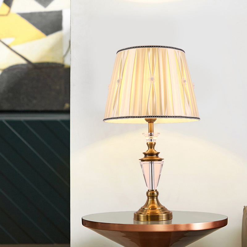 Modernistische bureaulamp met 1 kop, beige taps toelopende drum-nachttafellamp met stoffen kap