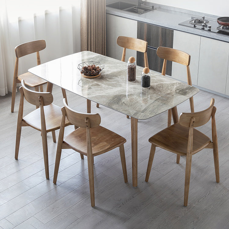 Eenvoudig gesinterde stenen eettafel 4 benen houten basis rechthoektafel voor thuis