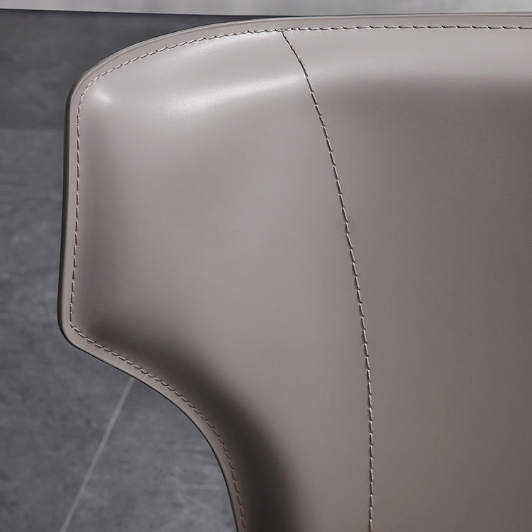 Silla lateral de comedor de cuero de estilo diseñador Silla de comedor Wingback para uso doméstico