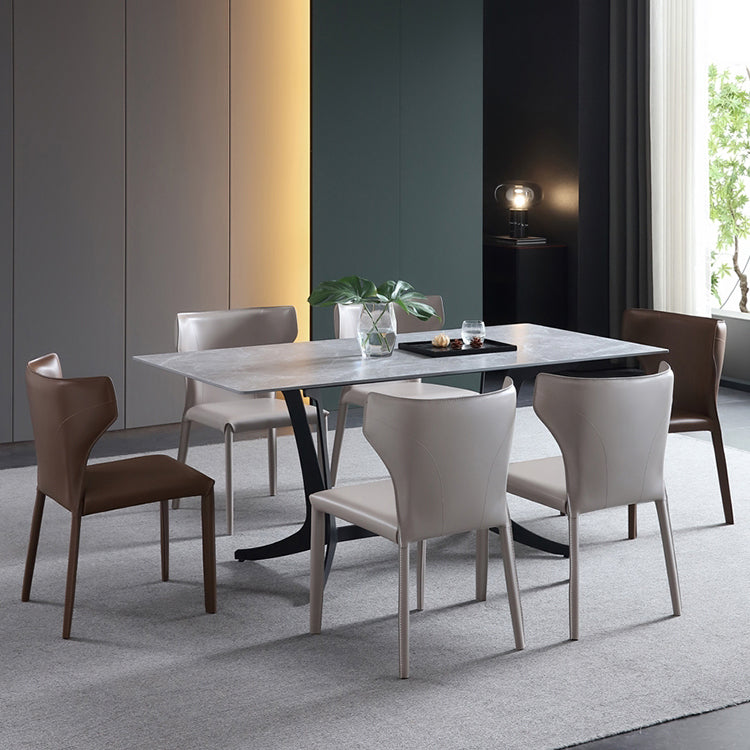Silla lateral de comedor de cuero de estilo diseñador Silla de comedor Wingback para uso doméstico