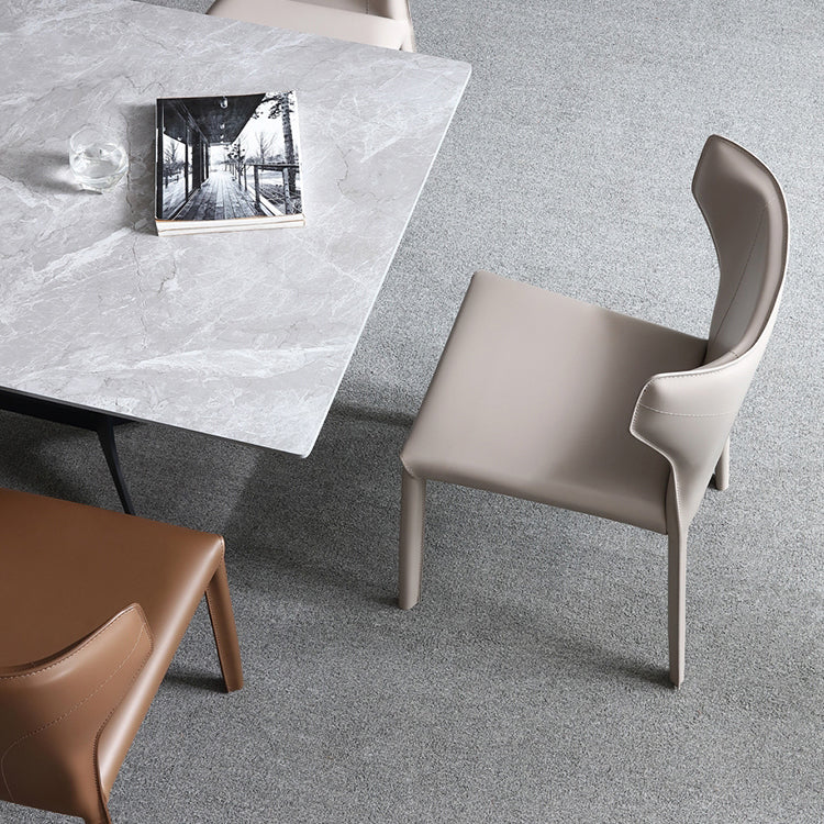 Silla lateral de comedor de cuero de estilo diseñador Silla de comedor Wingback para uso doméstico