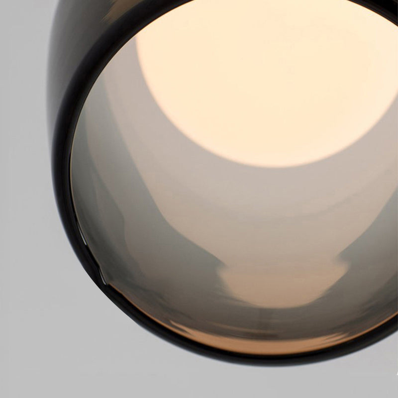 Lampe suspendue à la cloche en verre dans un pendentif en fer forgé moderne pour chambre à coucher