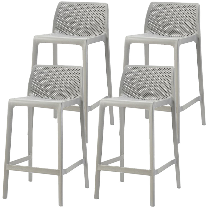 Taburetes de bar interiores apilables de plástico escandinavo con respaldo bajo