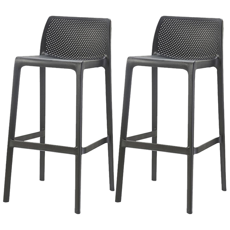 Taburetes de bar interiores apilables de plástico escandinavo con respaldo bajo
