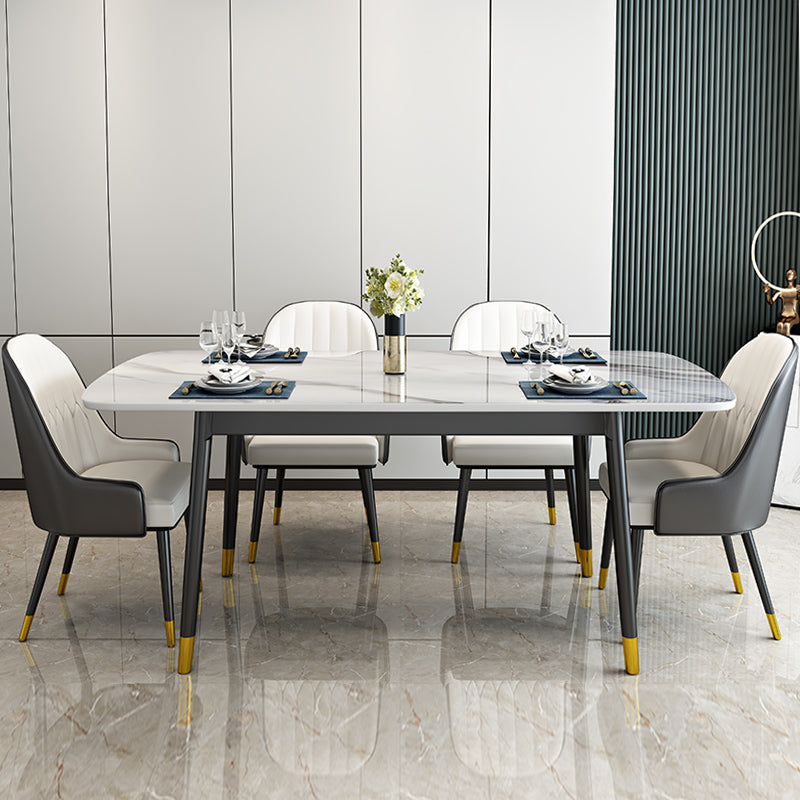 Mesa de comedor de piedra sinterizada Estilo de lujo 4 patas Mesa de rectángulo de base de acero al carbono para el hogar