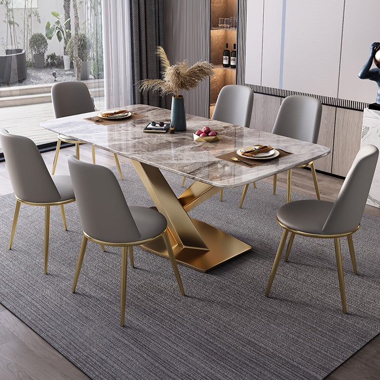 Mesa de comedor de lujo tradicional rectángulo mesa de piedra sinterizada gris con base de pedestal dorado