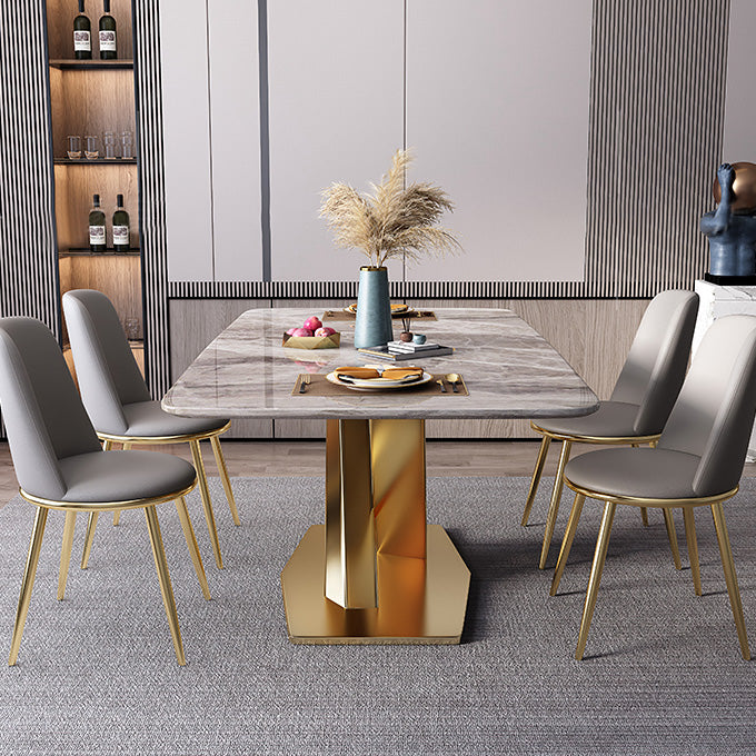 Mesa de comedor de lujo tradicional rectángulo mesa de piedra sinterizada gris con base de pedestal dorado