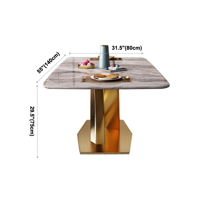 Mesa de comedor de lujo tradicional rectángulo mesa de piedra sinterizada gris con base de pedestal dorado