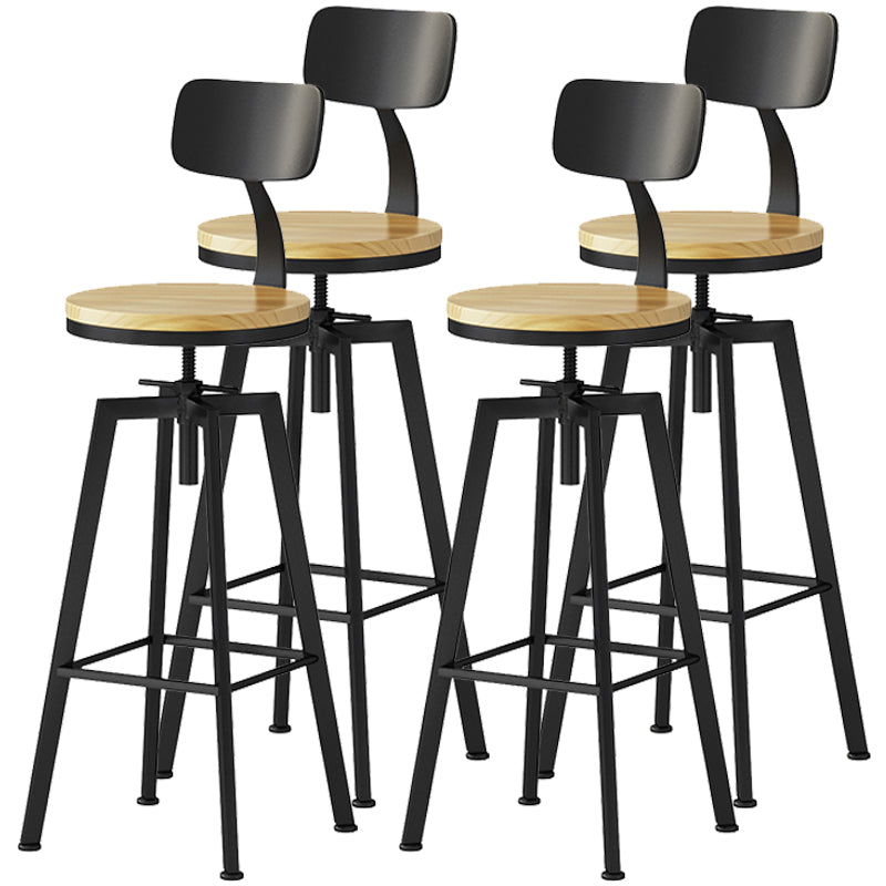 Industrielle höhenverstellbare schwarze Barhocker aus Eisen und Holz mit rundem Sitz