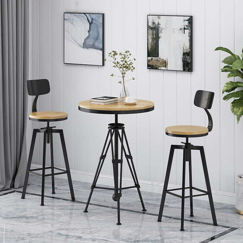 Industrielle höhenverstellbare schwarze Barhocker aus Eisen und Holz mit rundem Sitz