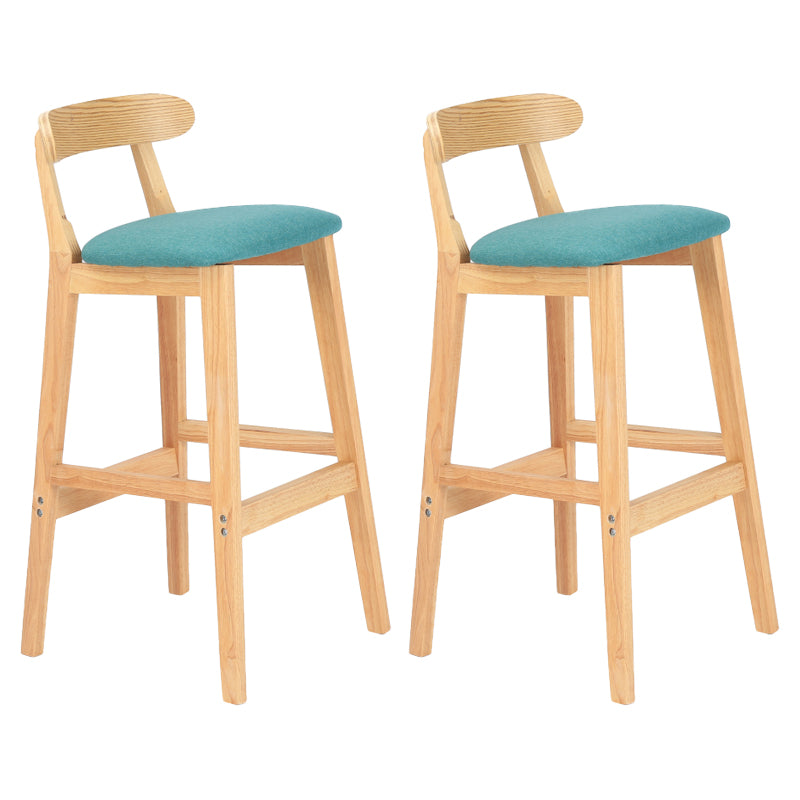 Taburete moderno de encimera sin brazo taburete de bar de madera con pedal y cojín