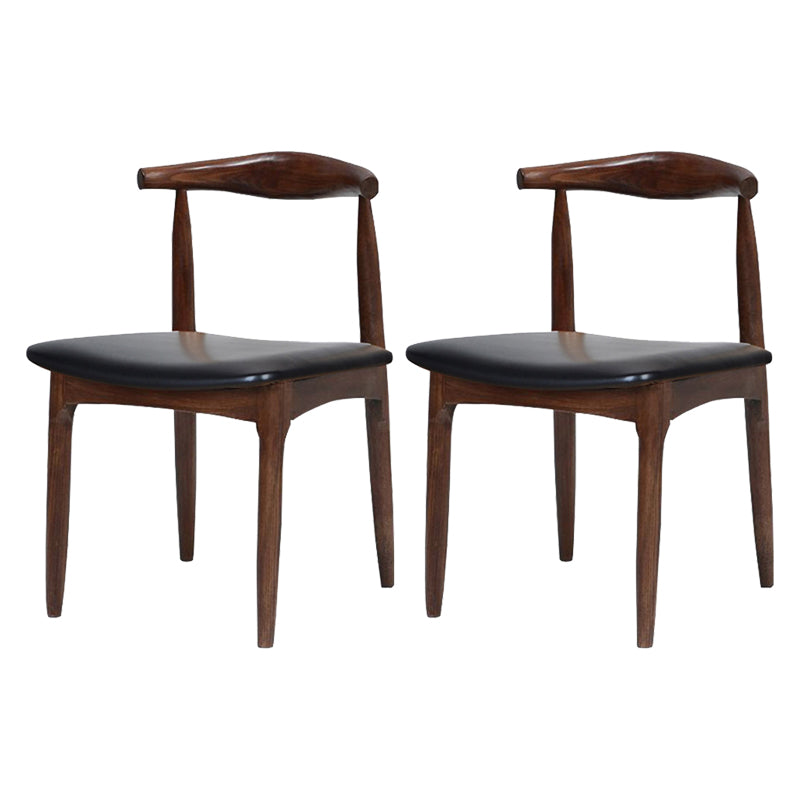 Silla lateral escandinava con respaldo abierto Silla de comedor tapizada con acabado mate