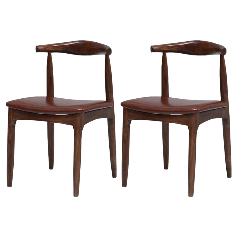 Silla lateral escandinava con respaldo abierto Silla de comedor tapizada con acabado mate