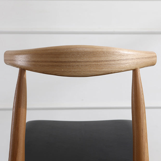 Silla lateral escandinava con respaldo abierto Silla de comedor tapizada con acabado mate