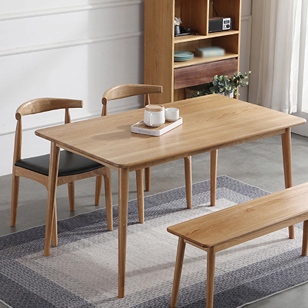 Silla lateral escandinava con respaldo abierto Silla de comedor tapizada con acabado mate