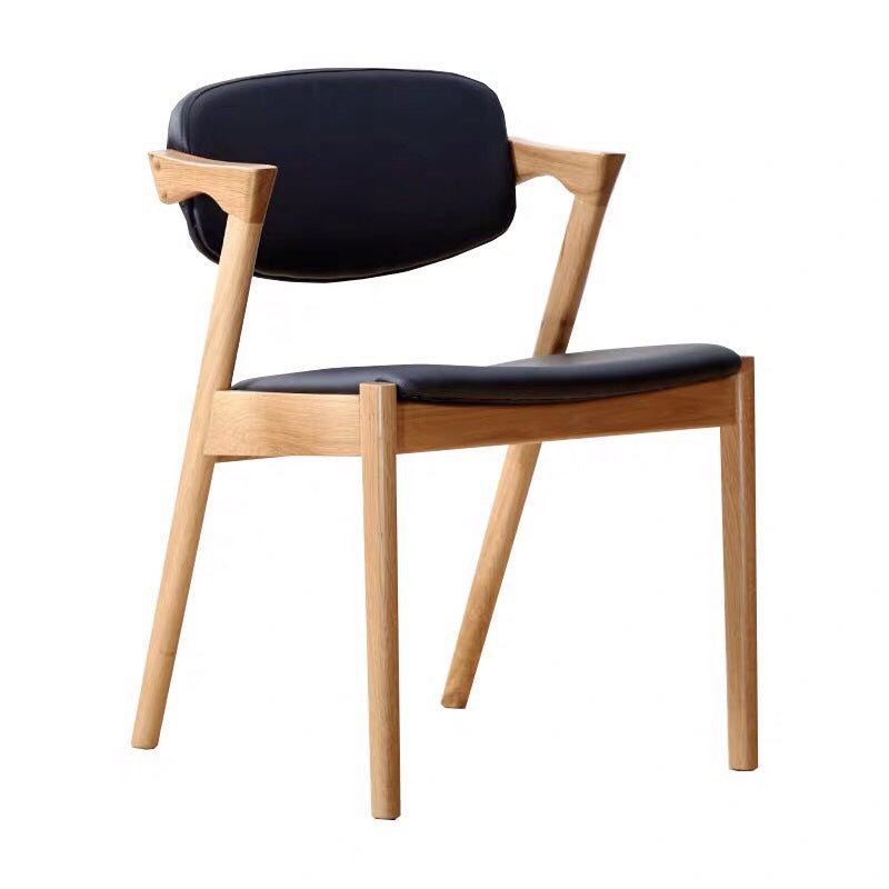 Silla de comedor de cuero natural con respaldo abierto de cocina contemporánea