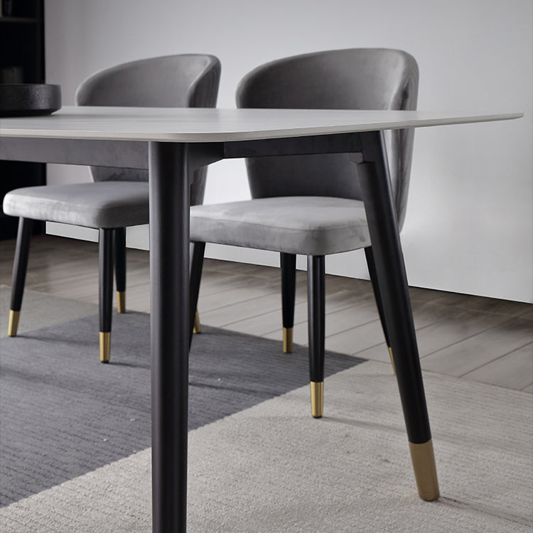 Mesa de comedor de lujo tradicional rectangular de piedra sinterizada mesa de comedor de 4 patas con marco negro