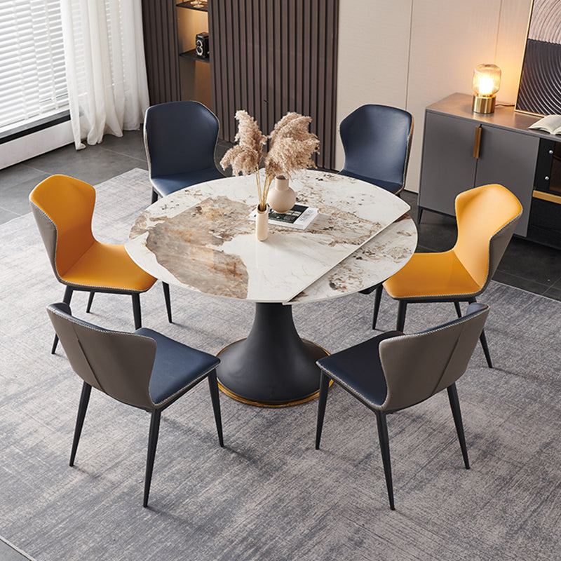 Mesa de comedor de piedra sinterizada de lujo con base de metal negro