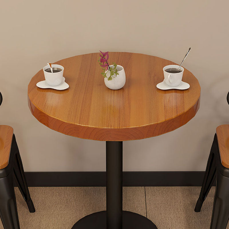 Table de bar en fer noir industriel en bois naturel rond